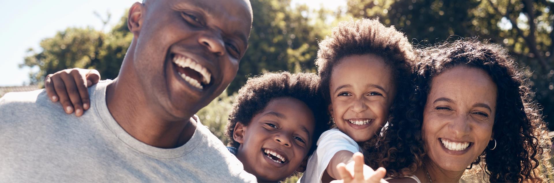 Family outside, Health and Housing Summer Fest
